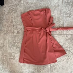 Coral romper that ties on side